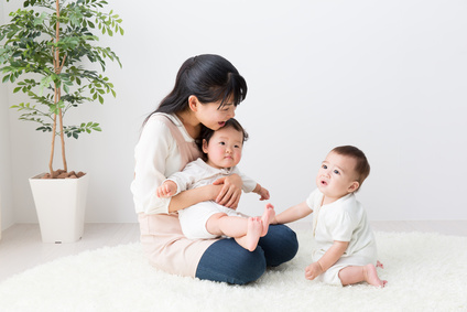 asian babys and mother in the room