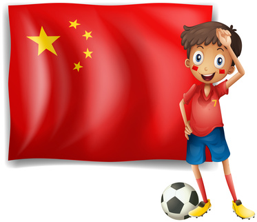 中国の国旗とサッカー少年